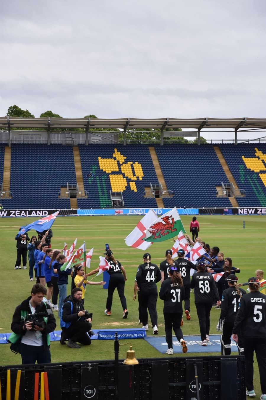 New Zealand walking out between the Sapphires flag lines