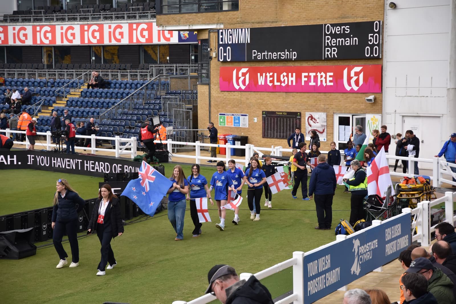 Sapphires flag bearers walking the boundary at Sophia Gardens