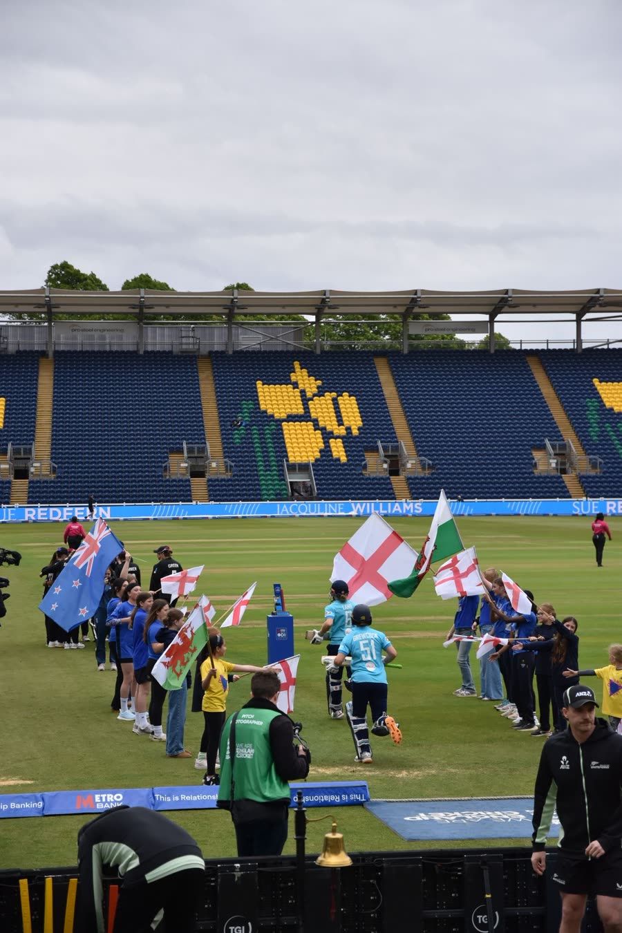 England batters walking out through the Sapphires flag tunnel
